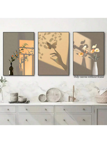 Transform your space with our Beige Sunlit Elegance: 3-Piece Un Frame Canvas Wall Art Set, featuring detailed floral and butterfly shadows. Let the neutral beige tones add a touch of elegance and sophistication to your home. Elevate your decor with this stunning piece that will surely leave a lasting impression.