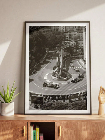Celebrate the thrill of the Monaco Grand Prix with this black and white canvas wall art. Featuring a detailed depiction of the iconic racing track, it offers a sleek, minimalist design that enhances any room. Perfect for racing enthusiasts, this poster brings a touch of motorsport heritage to your space while maintaining a modern aesthetic. Durable canvas ensures longevity, making it a timeless piece for fans who appreciate both art and racing history.