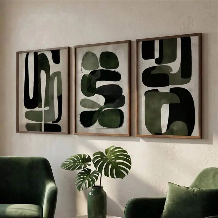 Olive abstract triptych above green chairs with a monstera vase