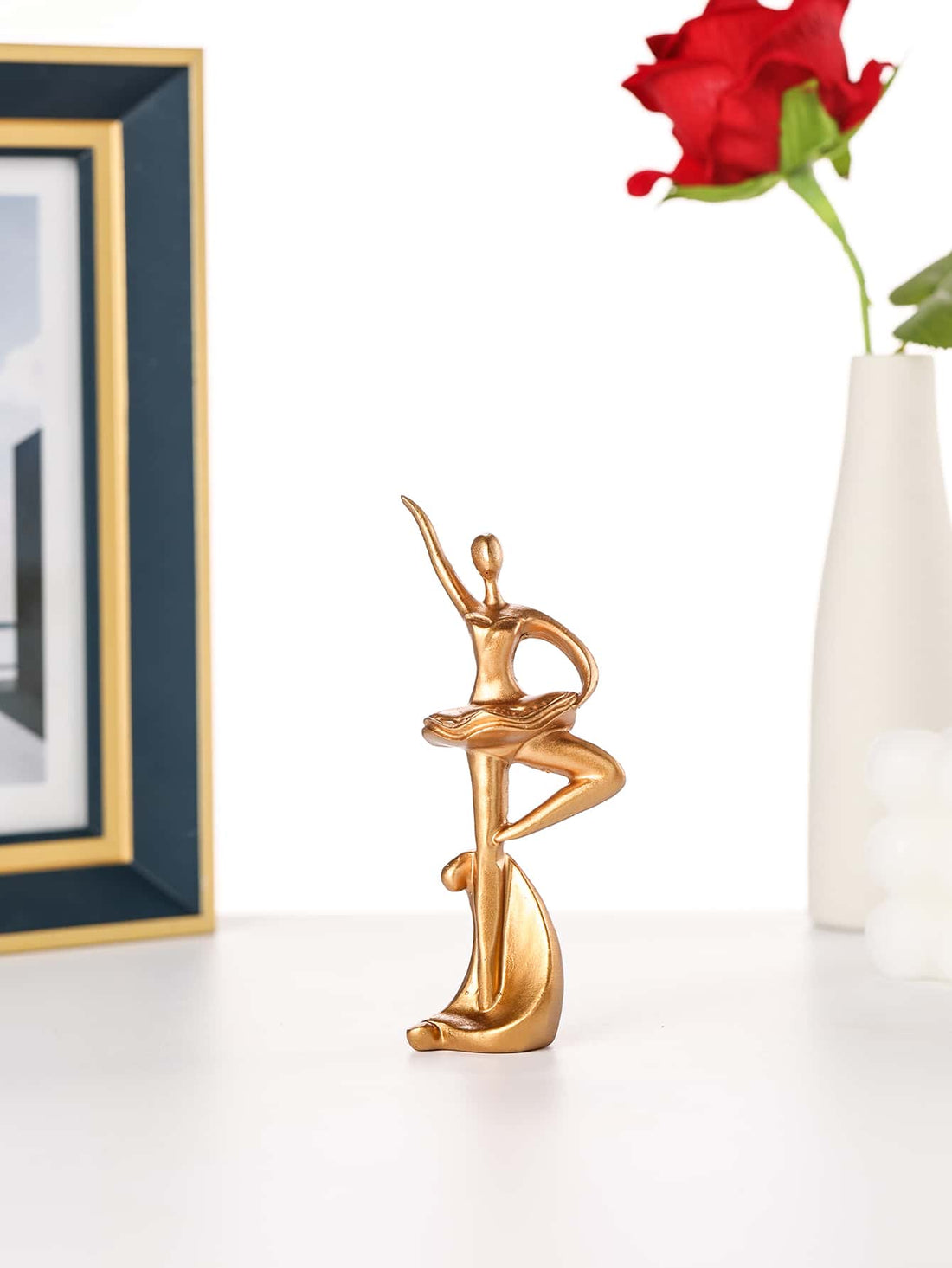 This elegant Ballet Dancer Decorative Object is the perfect addition to your home decor. Crafted with grace and attention to detail, it adds a touch of sophistication to any room. Made from high-quality materials, it is not only aesthetically pleasing but also durable. A must-have for any ballet lover or interior design enthusiast.