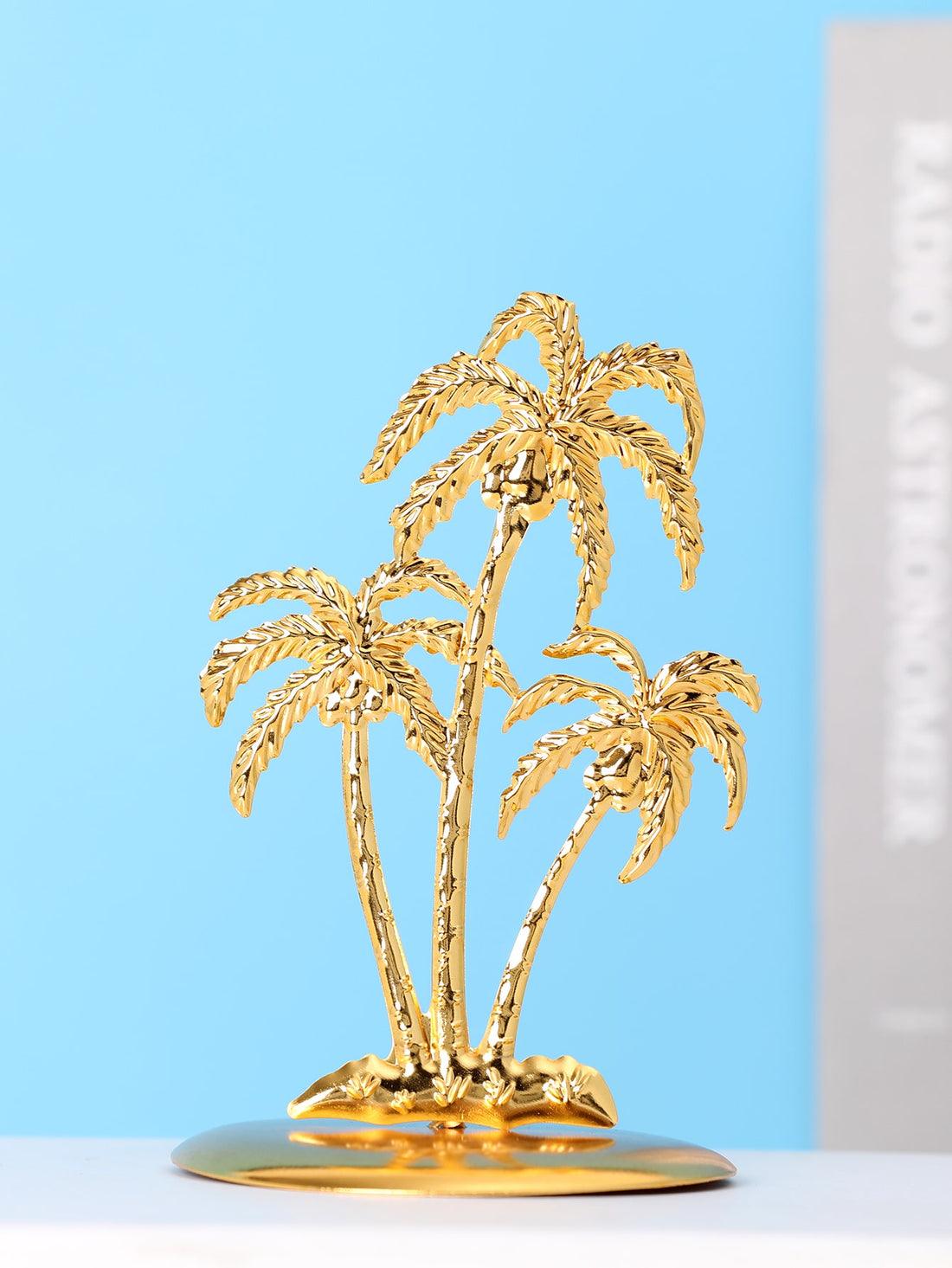 Add a touch of elegance to your space with our Chic Silver Iron Coconut Tree Ornament. Made of high-quality iron, this tropical-inspired piece will bring a sophisticated and stylish touch to any room. Perfect for those seeking a touch of nature in a modern design