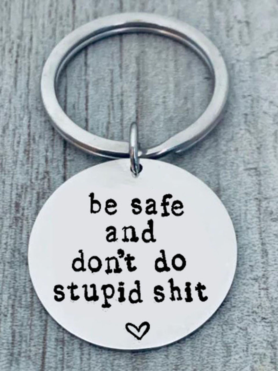 Stay street smart with our 'Don't Do Stupid' keychain! A playful reminder for your everyday adventures, this keychain is a must-have for any adventure seeker. Made with quality materials, it's a durable and practical addition to your daily carry. Stay safe and have fun with Street Smart.