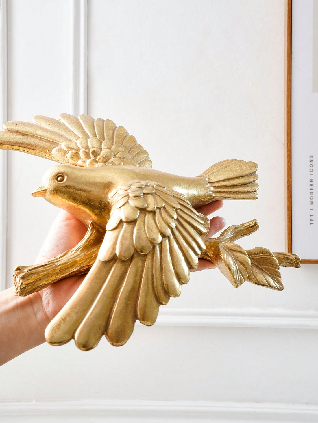 Elevate the style of any room with our Vintage Gold Resin Flying Bird Wall Decoration. Handcrafted with intricately detailed resin, this stunning piece adds a touch of elegance to your home decor. Perfect for any room, this unique and timeless piece is sure to impress.