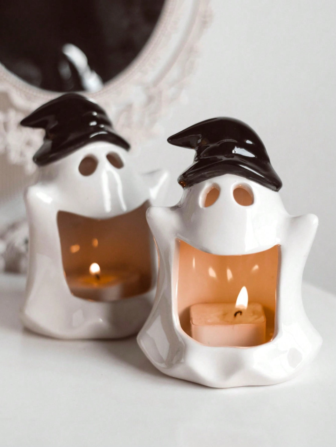 Add a touch of ghoulish charm to your wedding or festival with our Ceramic Ghost Candlestick. Made with exquisite craftsmanship, this piece serves as a charming decoration while providing a subtle source of light. Its unique design and quality materials make it the perfect addition to any spooky event.