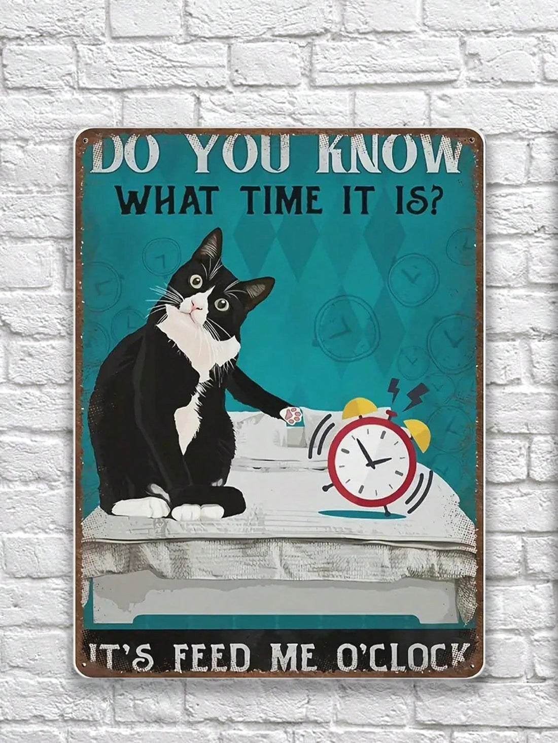 Add a charming touch to your home decor with our Vintage Feed Me O'clock Funny Tuxedo Cat Tin Sign. Perfect for kitchens, garages, and man caves, this sign is sure to bring a smile to your face every time you see it. Made from durable tin, it's built to last for years to come.