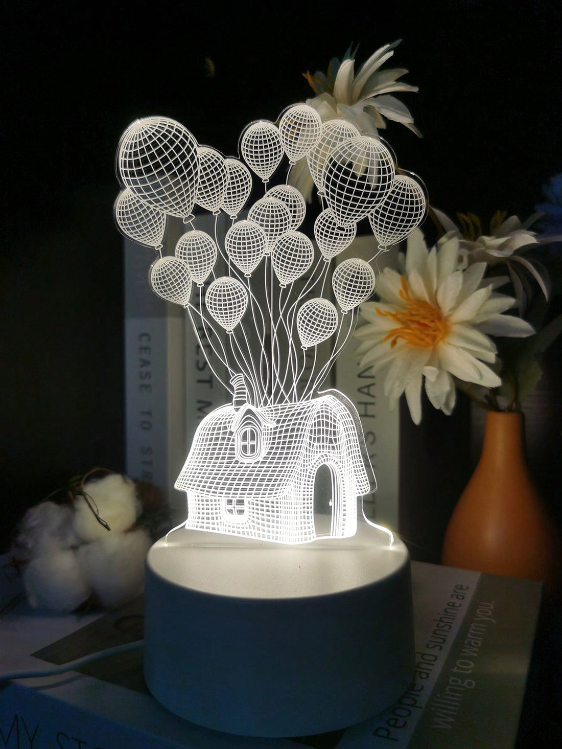 Enhance the holiday spirit and create a romantic atmosphere in your bedroom with our Dreamy Balloon House LED Night Light. Perfect for Christmas decoration, this charming night light offers a warm and cozy glow with its energy-efficient LED bulbs. Let its dreamy ambiance transport you to a magical world.