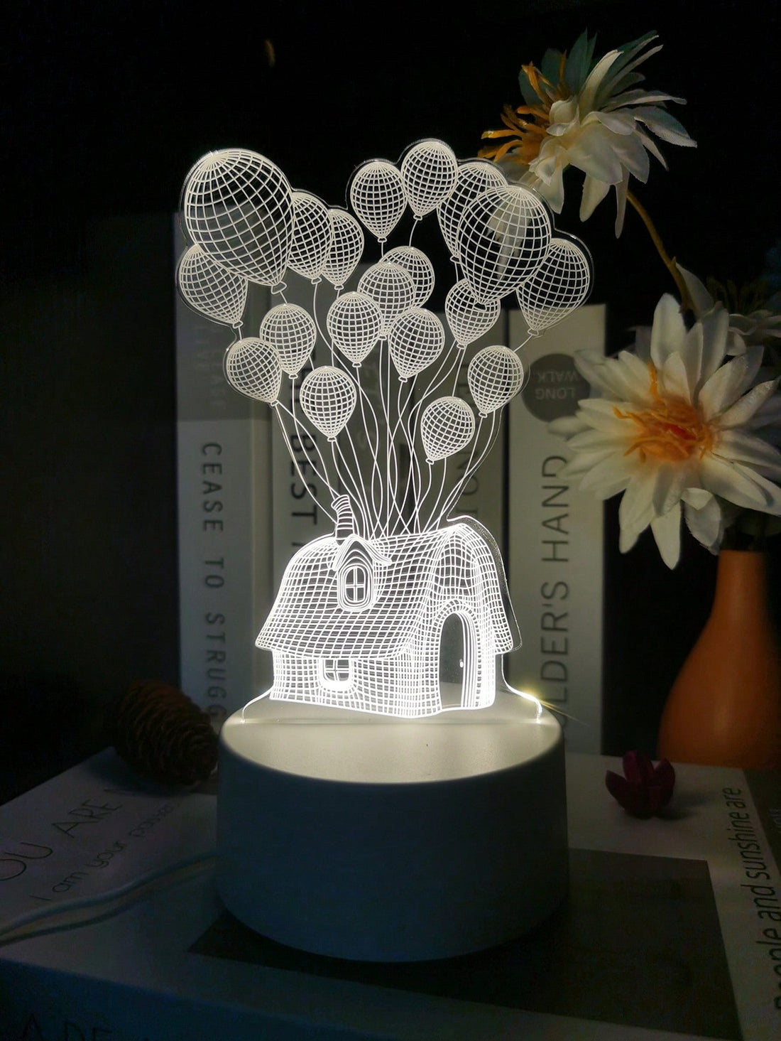 Enhance the holiday spirit and create a romantic atmosphere in your bedroom with our Dreamy Balloon House LED Night Light. Perfect for Christmas decoration, this charming night light offers a warm and cozy glow with its energy-efficient LED bulbs. Let its dreamy ambiance transport you to a magical world.