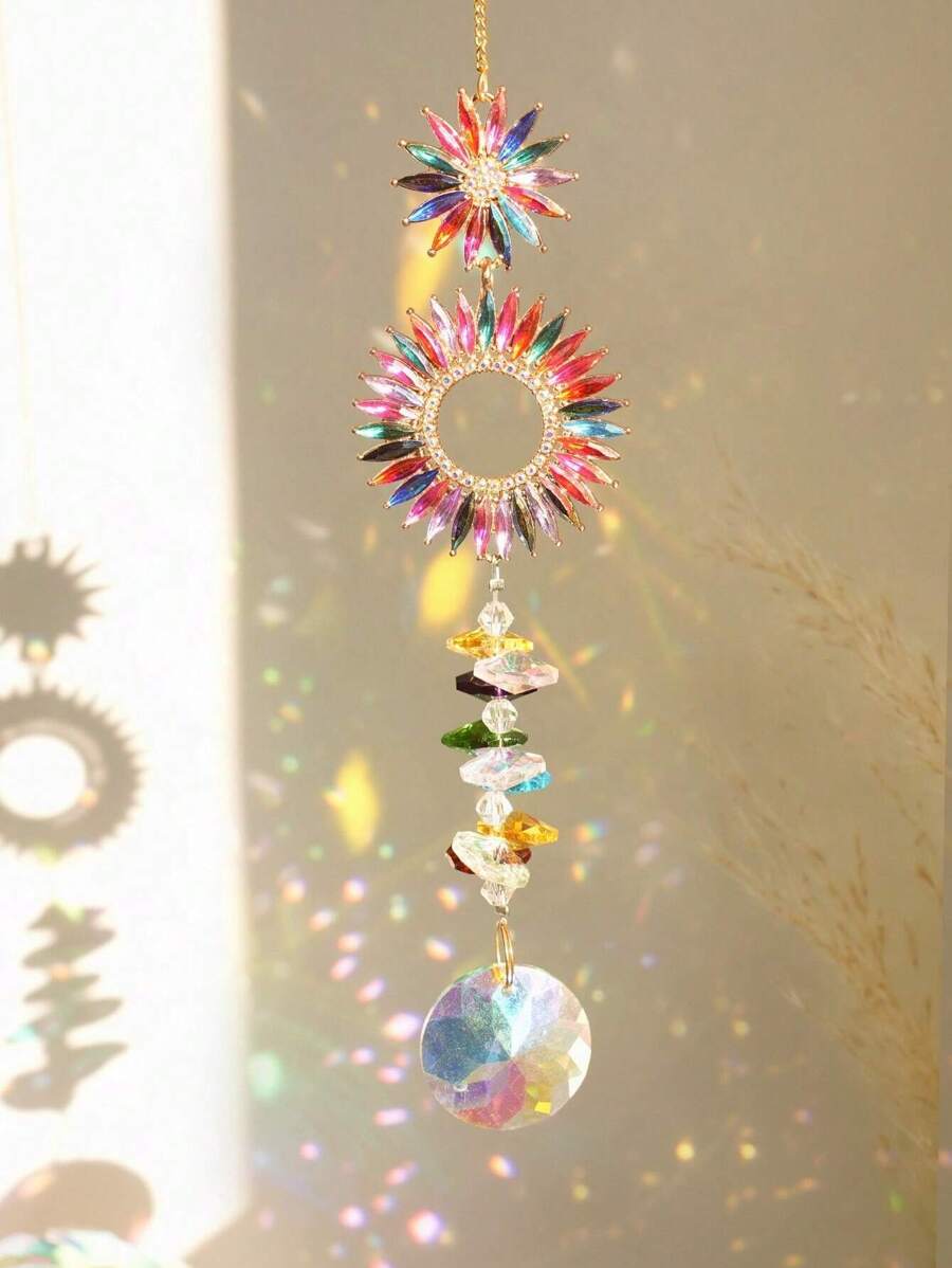 Close-up of colorful floral crystal suncatcher with rainbow petal rings and faceted crystal beads