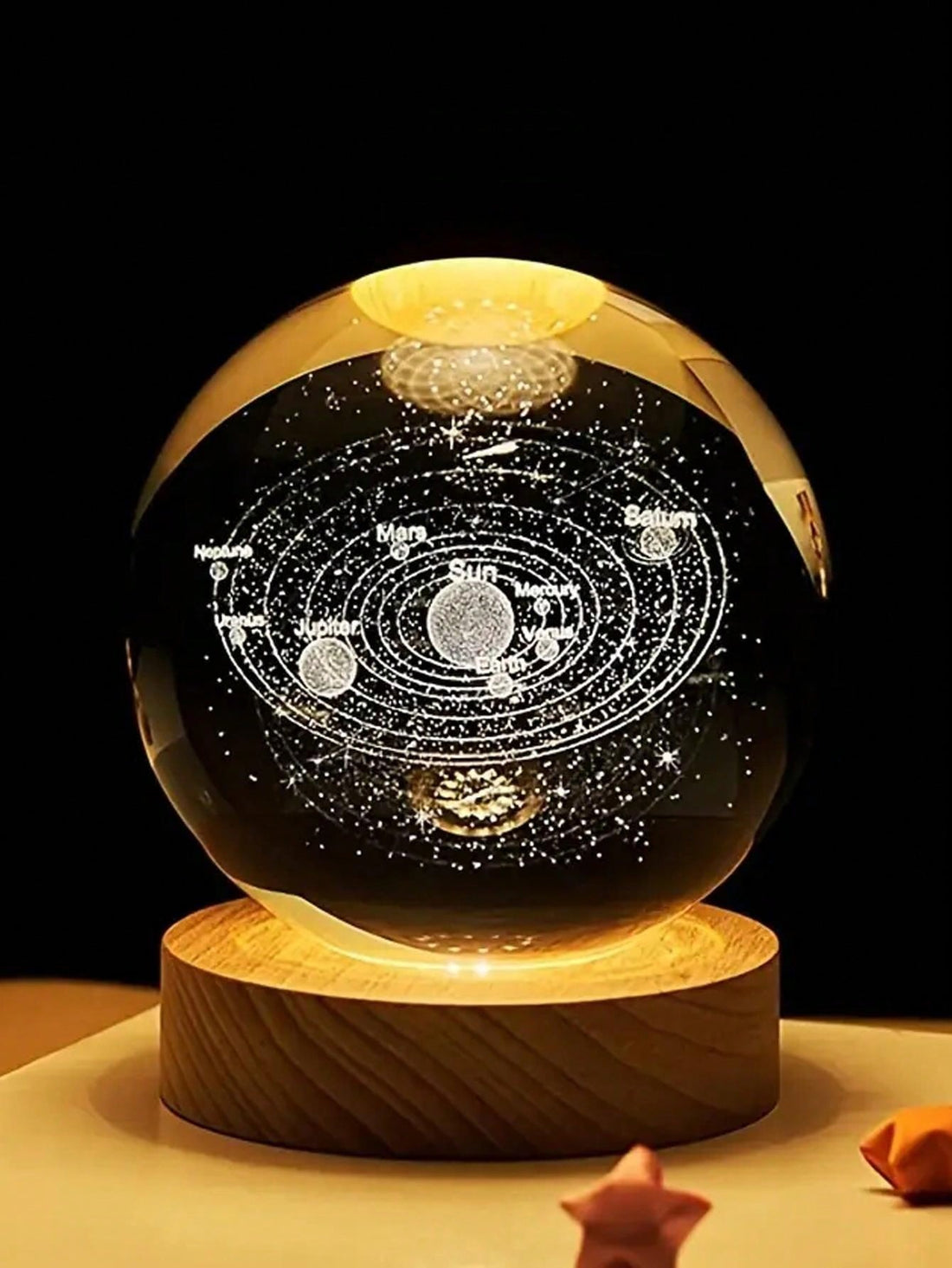 Illuminate your room with the Celestial Crystal Ball Night Light. This cosmic home decor accent features a stunning crystal ball that lights up to create a peaceful and dreamy atmosphere. Perfect for any bedroom or living space, this unique piece is a must-have for any celestial enthusiast.