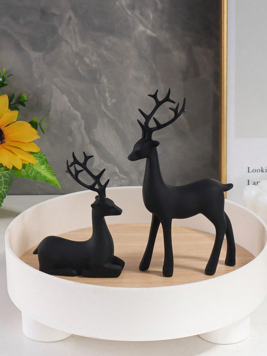 Add a touch of elegance to your home decor with this Black Deer Figurine Set. Crafted with intricate details, these stunning table ornaments will make a beautiful addition to any space. Made of high-quality materials, they are durable and long-lasting.