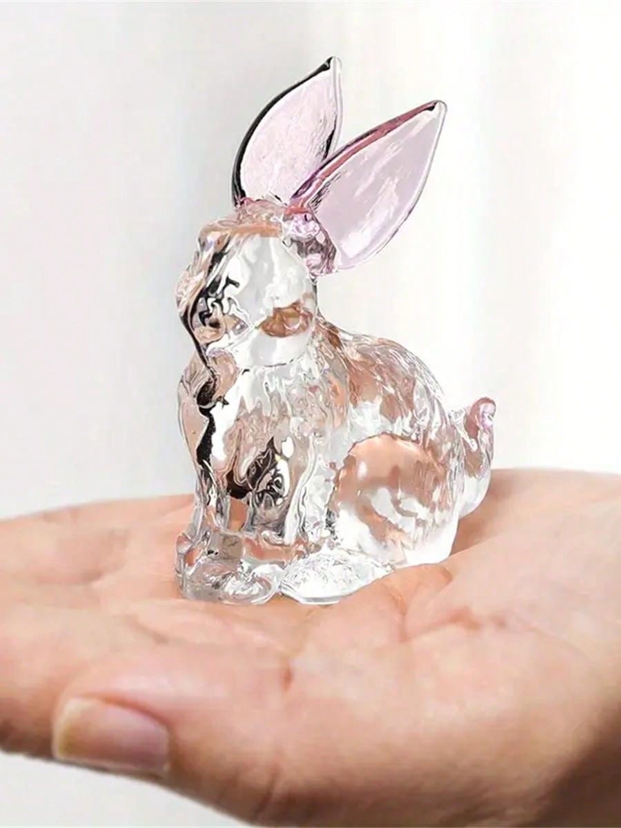 Add a touch of elegance to your home with our Crystal Rabbit Ornament. This adorable transparent bunny décor is perfect for displaying in your home or giving as a thoughtful teacher appreciation gift. Made of high-quality crystal, this ornament is sure to add a touch of sophistication to any space.