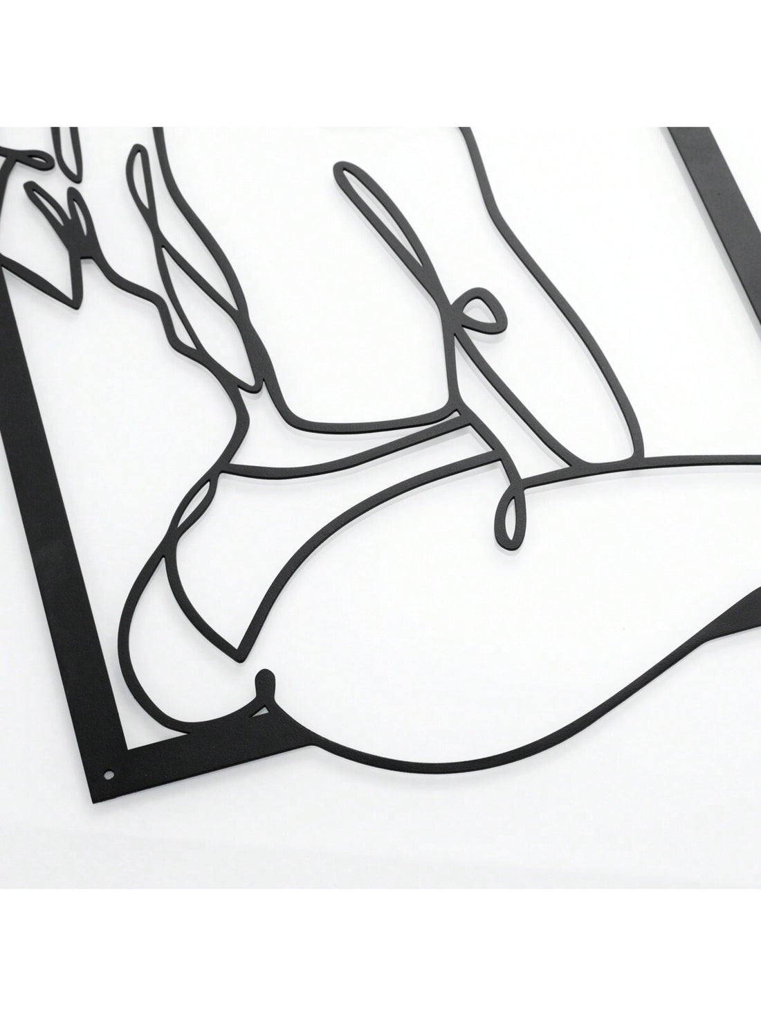 Elevate your home with the Sensual Silhouette: Abstract Line Art Metal Wall Decor Set. These elegant pieces infuse your space with a touch of modern sophistication. Featuring sleek, abstract designs, this set adds an artistic touch to any room. Crafted from high-quality metal, these pieces are durable and long-lasting.