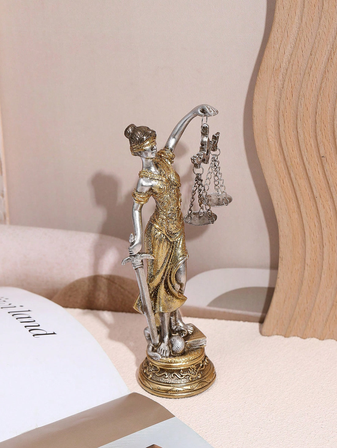 Add an elegant touch to your home office decor with our inspiring Goddess of Fairness &amp; Justice statue. Made from high-quality materials, this stunning statue not only exudes beauty but also represents fairness and balance in all aspects of life. Perfect for those seeking a touch of grace and wisdom in their work space.