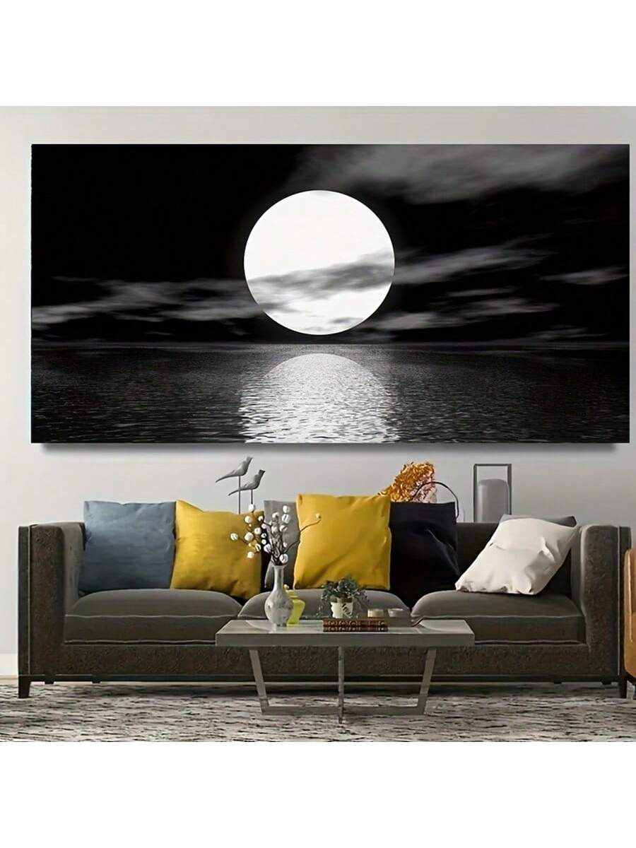This elegant black and white canvas poster captures the serene beauty of the moon over a tranquil ocean, making it an ideal addition to modern home or office décor. Its minimalist design enhances any space with a sophisticated, calming atmosphere, perfect for creating a refined and peaceful environment. Crafted for durability and visual impact, this artwork complements contemporary interiors with timeless style.