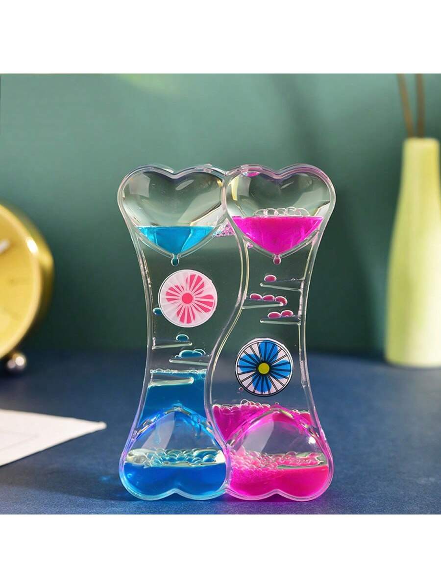 Relax and de-stress with our Double Heart Liquid Timer! Perfect for students and children, this ornamental timer features a durable design and is filled with colorful liquid to provide a calming visual experience. Improve focus and reduce anxiety with this stress-relieving tool.