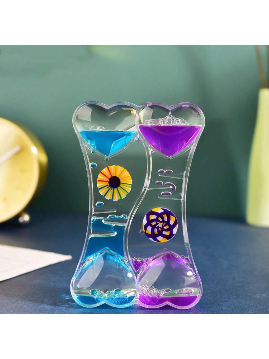 Relax and de-stress with our Double Heart Liquid Timer! Perfect for students and children, this ornamental timer features a durable design and is filled with colorful liquid to provide a calming visual experience. Improve focus and reduce anxiety with this stress-relieving tool.