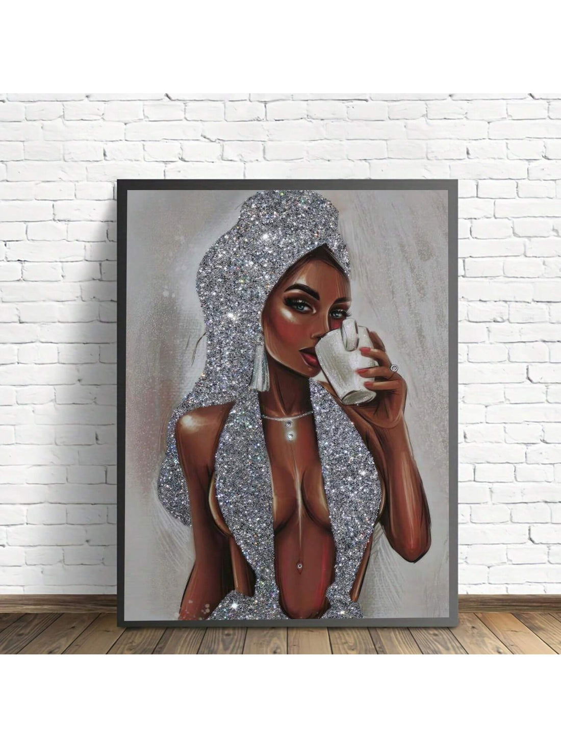 Bring a touch of modern minimalism to any room with our Silver Glitter Girl Canvas Painting. The gorgeous silver glitter adds a subtle sparkle to this stunning piece of art. Perfect for adding a chic and sophisticated touch to your home decor.