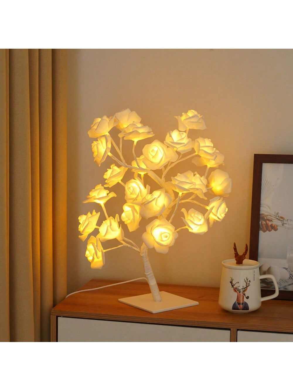 Introducing the Enchanting Rose Tree Light, the perfect home decoration for girls, women, and teens. With its beautiful and delicate rose design, this light adds a touch of enchantment to any room. Enhance your space with the soft and warm glow, creating a cozy and inviting atmosphere. Perfect for bedrooms, living rooms, or any space in need of a touch of elegance.