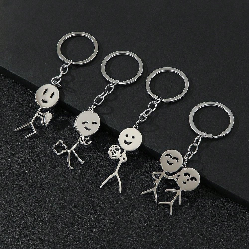 Elevate your keychain game with our Quirky Cartoon Couple Keychain! Designed with trendy teens and gift lovers in mind, this stainless steel pendant adds a playful touch to your accessories. Show off your fun, unique style with this must-have keychain.