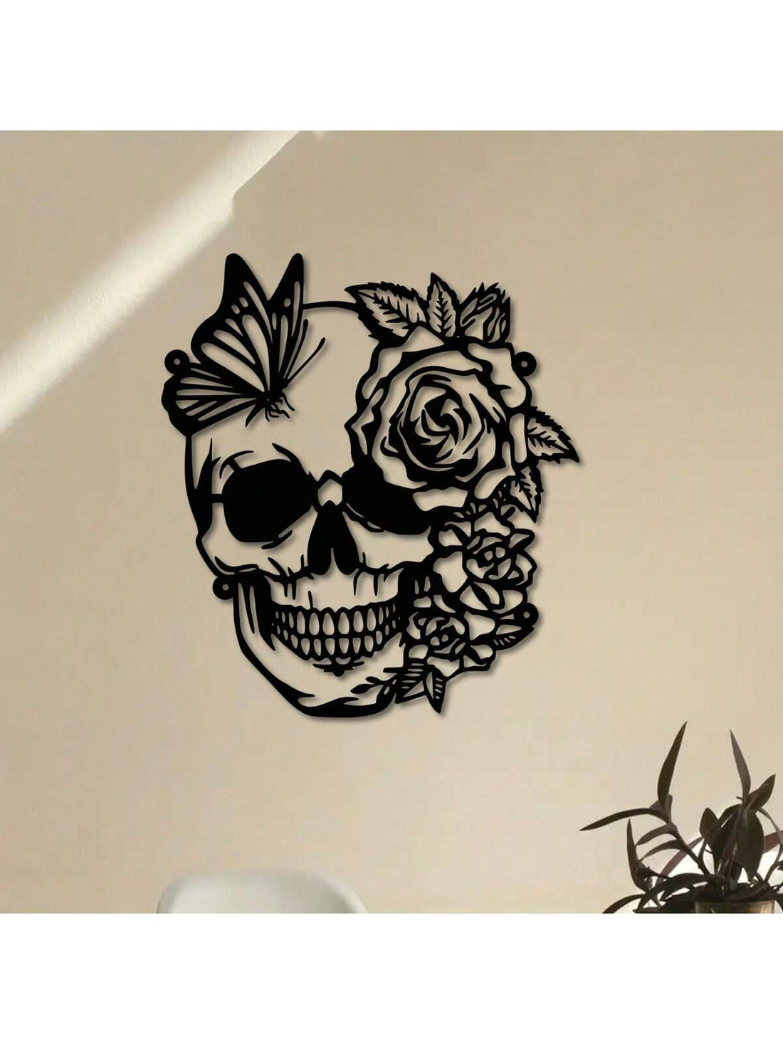 Elevate your Halloween home decor with our must-have Skull, Flower, Butterfly Metal Wall Art. Crafted with expert precision, this unique piece features intricate details of a skull, flower, and butterfly for a spooky yet elegant touch. Perfect for any Halloween enthusiast looking to add a touch of sophistication to their decor.