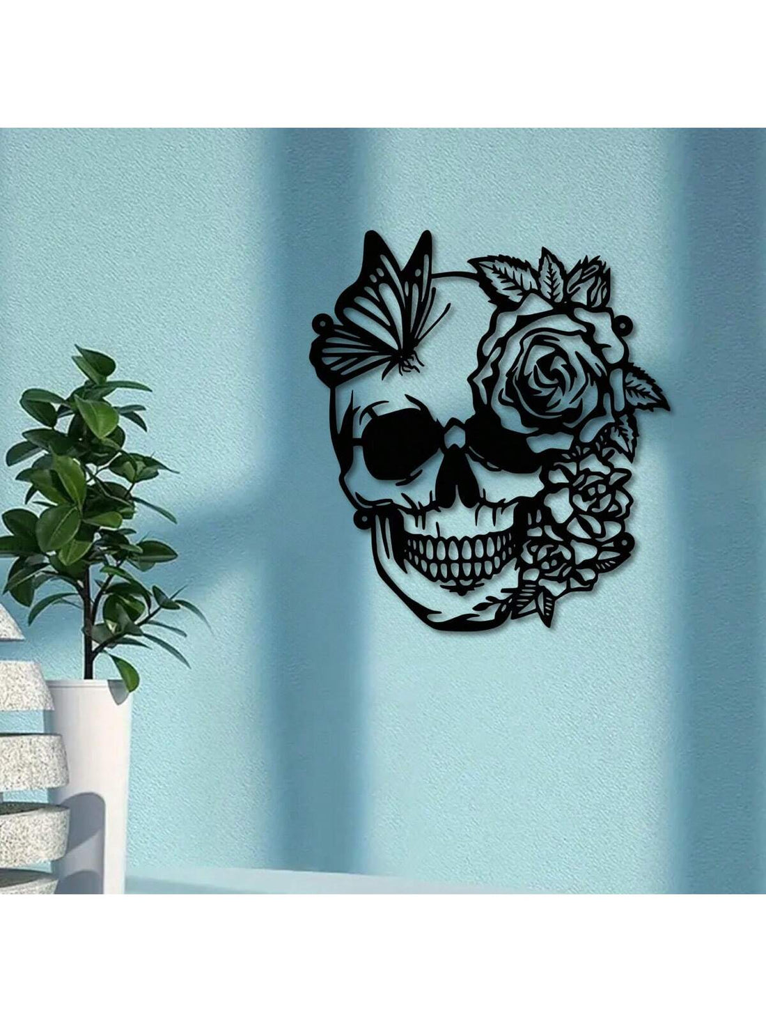 Elevate your Halloween home decor with our must-have Skull, Flower, Butterfly Metal Wall Art. Crafted with expert precision, this unique piece features intricate details of a skull, flower, and butterfly for a spooky yet elegant touch. Perfect for any Halloween enthusiast looking to add a touch of sophistication to their decor.