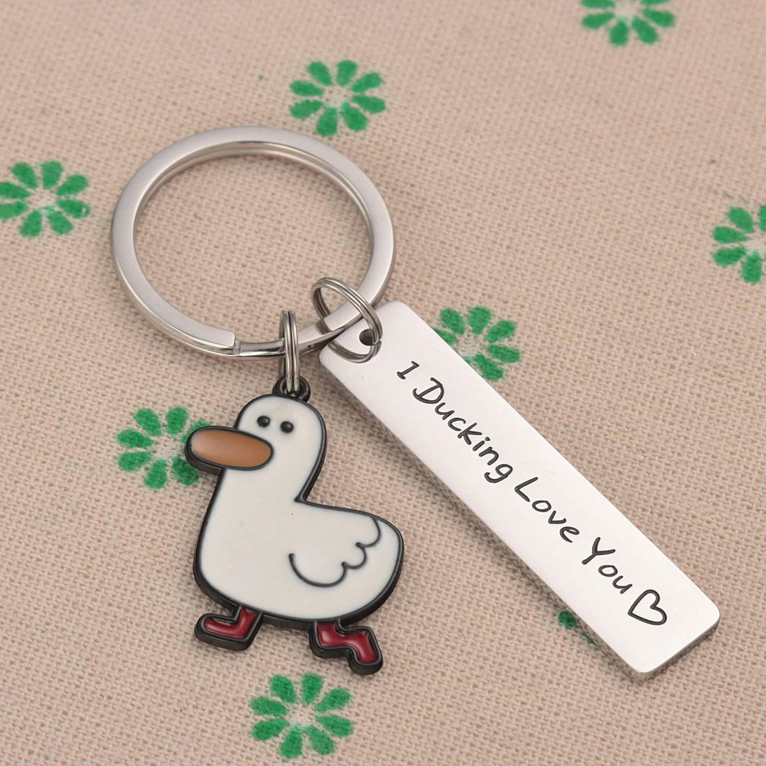 The Adorable Duck Keychain is the perfect accessory for duck lovers. Made of high-quality stainless steel, this creative pendant is not only durable but also adds a touch of cuteness to any bag or gift. Show off your love for these lovable creatures with this unique keychain.