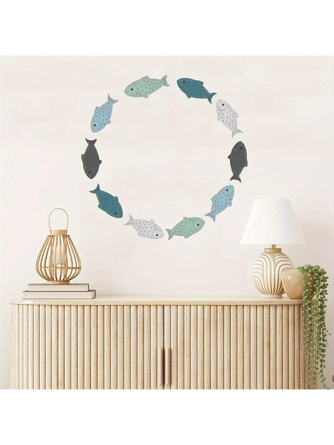 Elevate your outdoor and lake house decor with our Nautical School of Fish Wooden Wall Decor. Bringing a coastal theme to your home, this wall decor adds a touch of nautical charm. Crafted from high-quality wood, it showcases a school of fish swimming in the ocean. Perfect for any water lover.