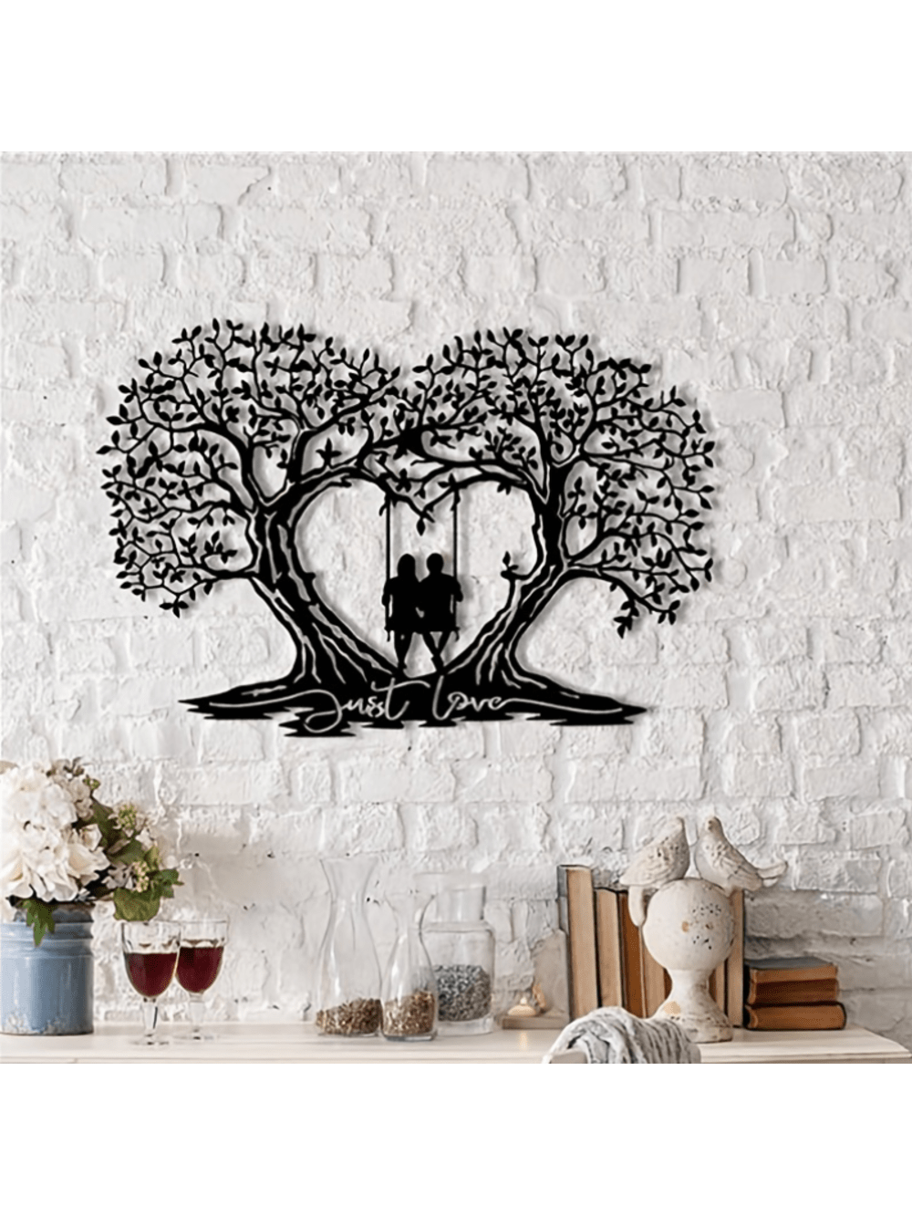 Add a touch of modern charm to your home with Nature's Charm: Black Metal Tree Wall Decor. Made from high-quality metal, this piece features a sleek black finish and a unique tree design. Perfect for adding a touch of nature and sophistication to any room.