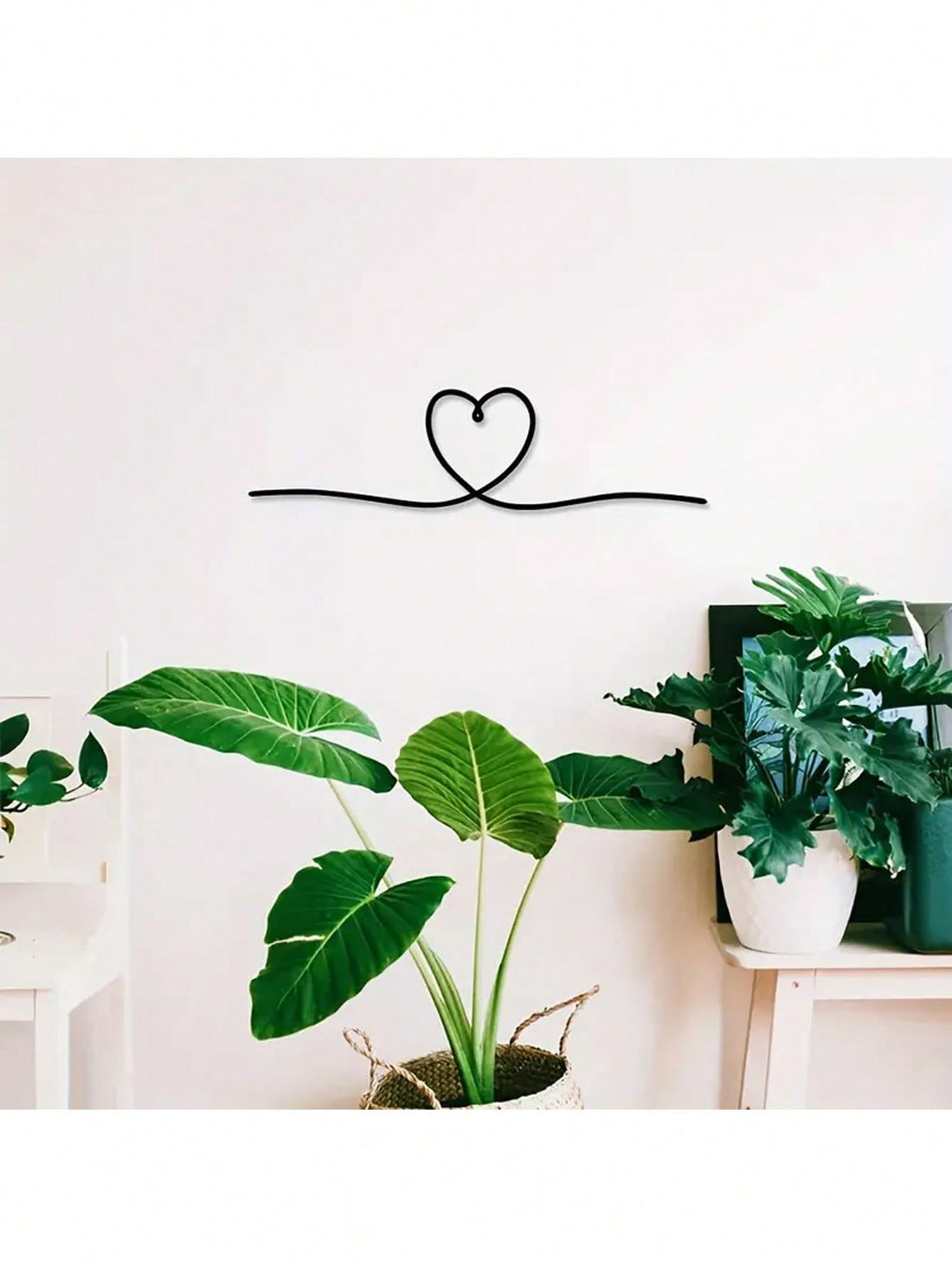 Bring a touch of love and modern style to your space with our Elegant Metal Heart Line Art. Its stylish design and durable metal material make it the perfect addition to any wall. Its minimalistic yet elegant look will bring a sense of sophistication to your home or office.