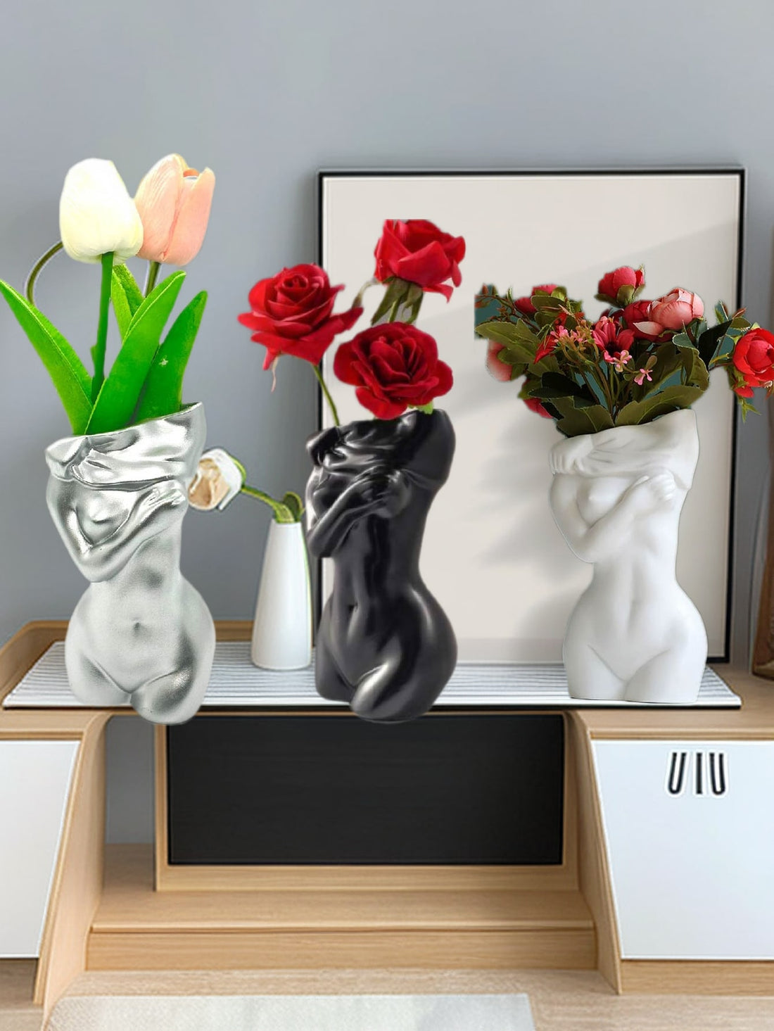 Elevate your modern home decor with the Nordic Chic Resin Flower Vase. Made from high-quality resin, this vase features a unique design inspired by Nordic aesthetics. Its durable construction and elegant design make it the perfect addition to any room. Add a touch of sophistication to your space with this stunning vase.