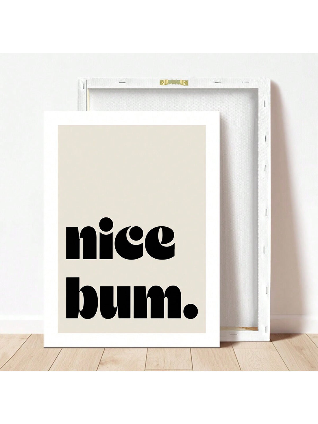 Elevate your interior design with our Chic 'Nice Bum' Canvas Poster. Perfect for adding a trendy touch to your bedroom, living room, or sofa backdrop. Use it to create a stylish bedside decoration or as part of your overall home decor. This high-quality print comes with no frame, providing a clean and modern look.