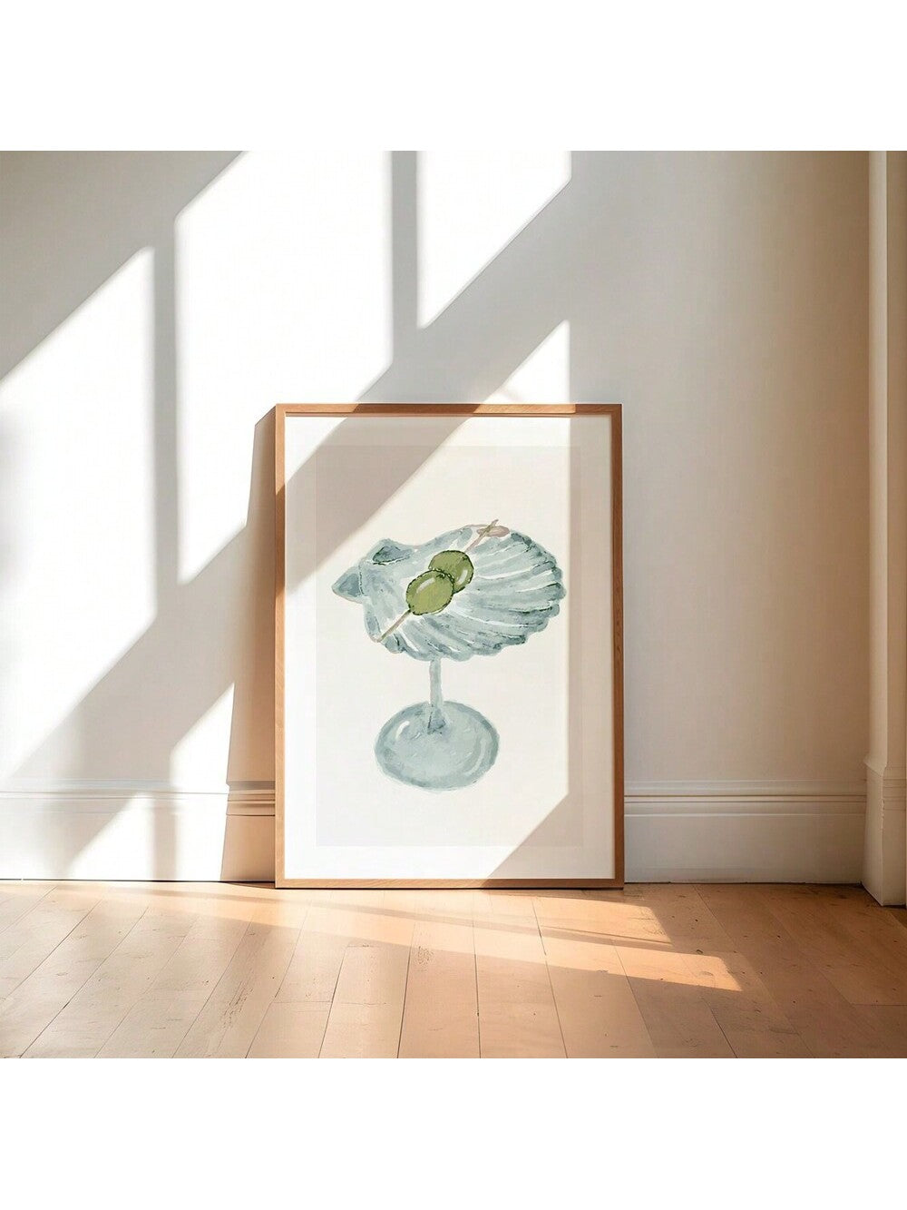 Elevate your home decor with our Seashell Martini Art Print. Perfect for cocktail enthusiasts, this stylish print features a unique combination of seashells and martinis, adding a touch of sophistication to any room. Available without a frame for versatile display options. Upgrade your space today.