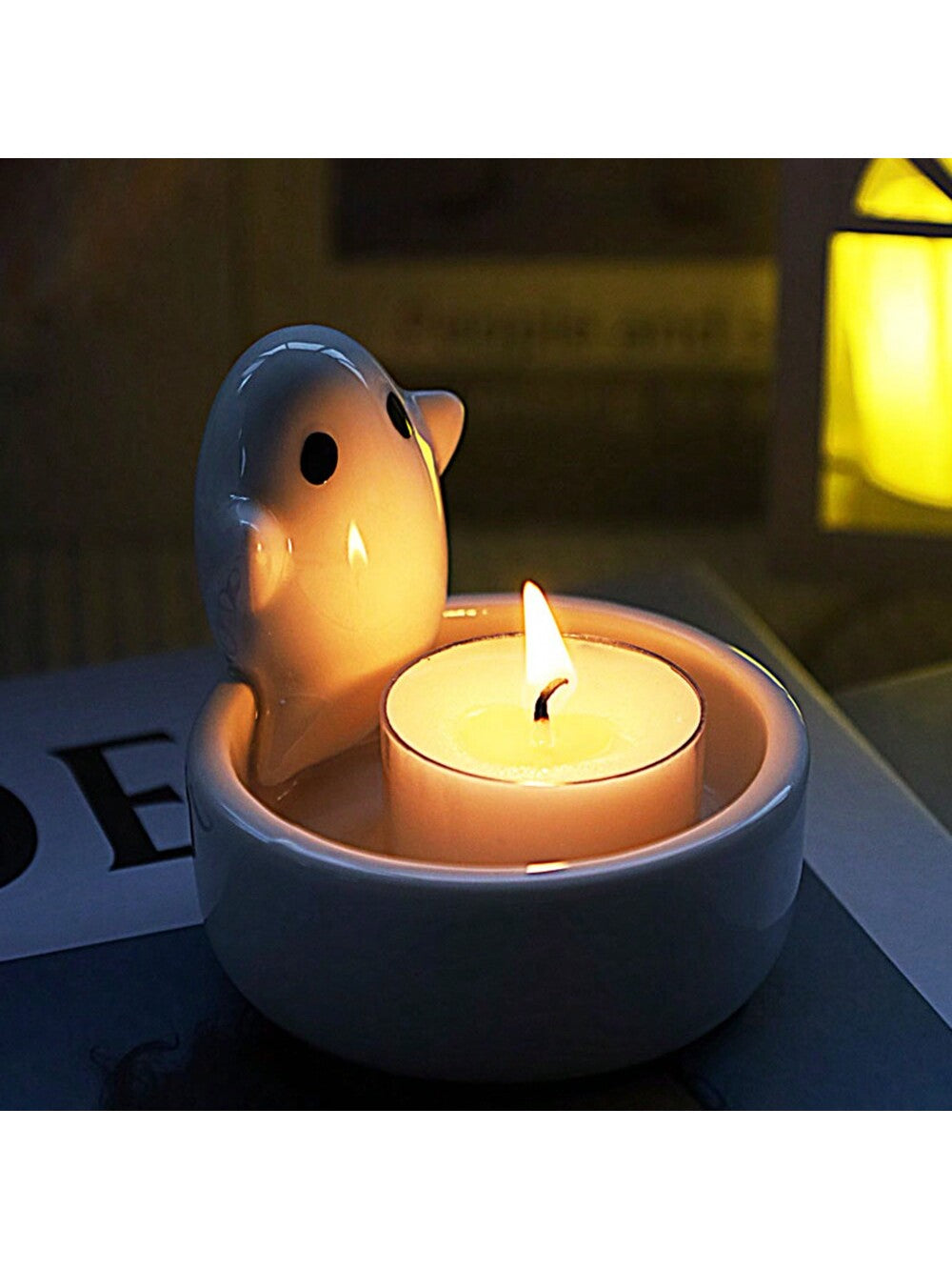 Add a spooky touch to your home decor with the Festive Ghost Ceramic Candle Holder. The stylish ceramic design features a ghost motif, perfect for creating a festive atmosphere. Made with quality materials, this candle holder is a durable and stylish addition to any home.