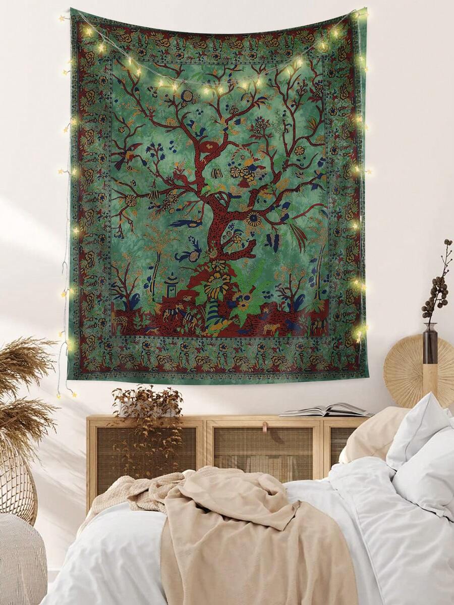 Green Tree of Life tapestry hanging on wall with plants and side tables