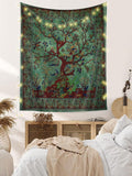 Tree of Life wall tapestry styled above bed with warm string lights