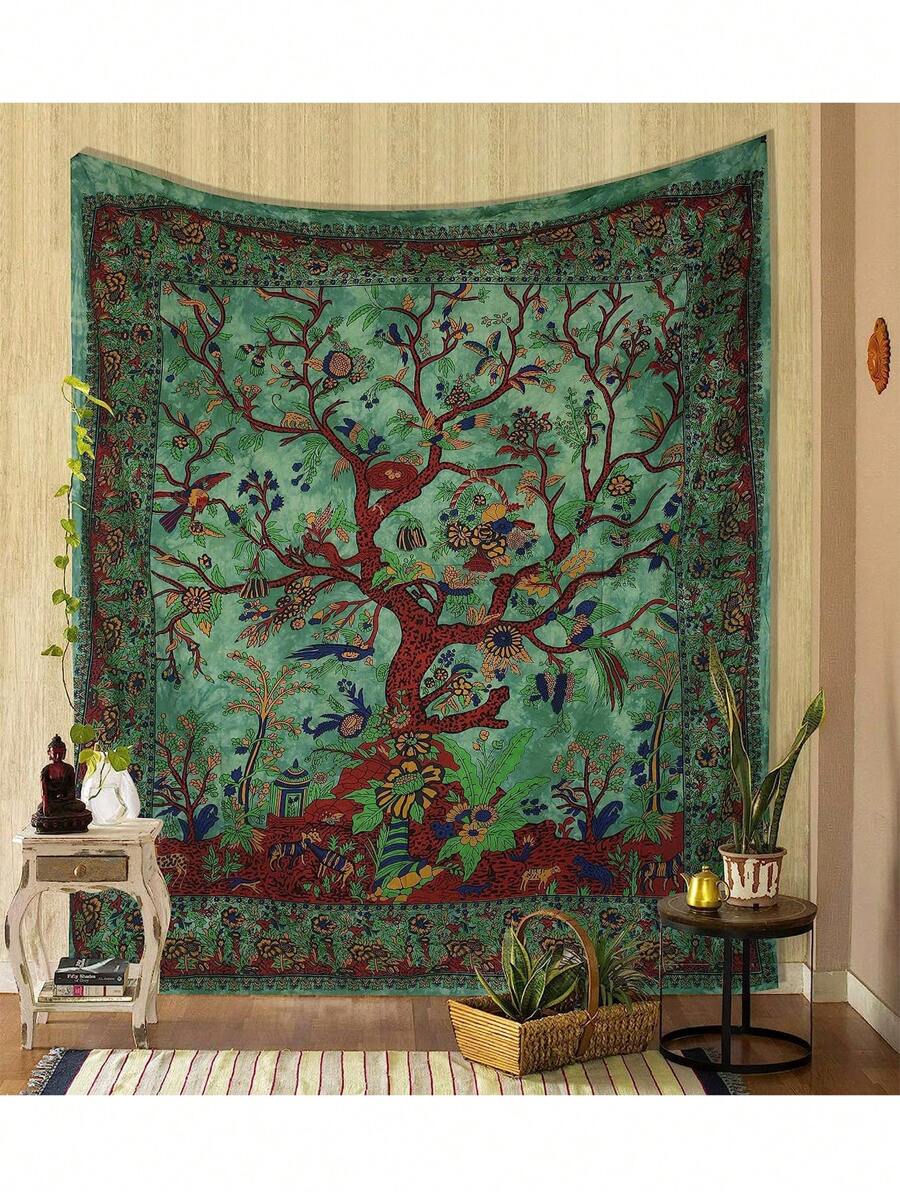 Green Tree of Life tapestry hanging on wall with plants and side tables