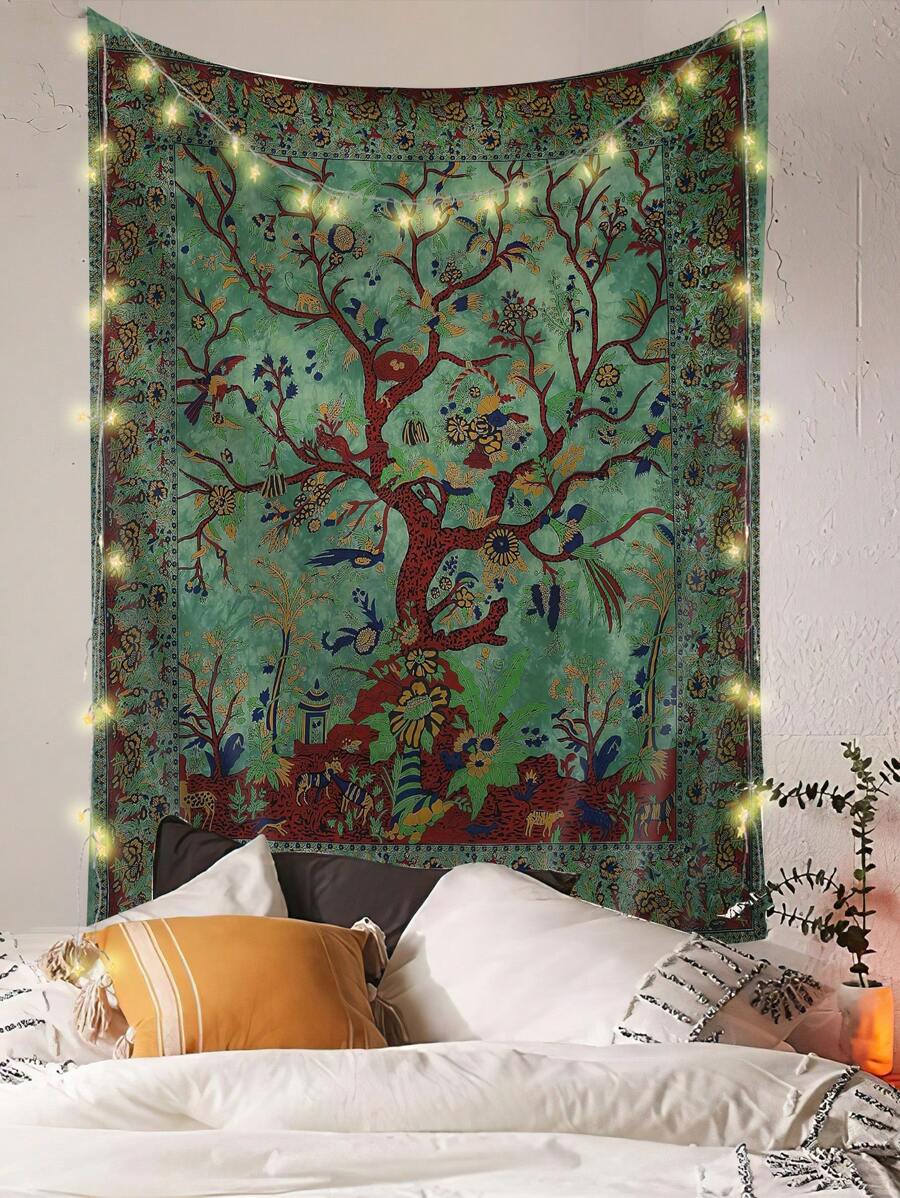 Close room view of green tree tapestry with fairy lights around border