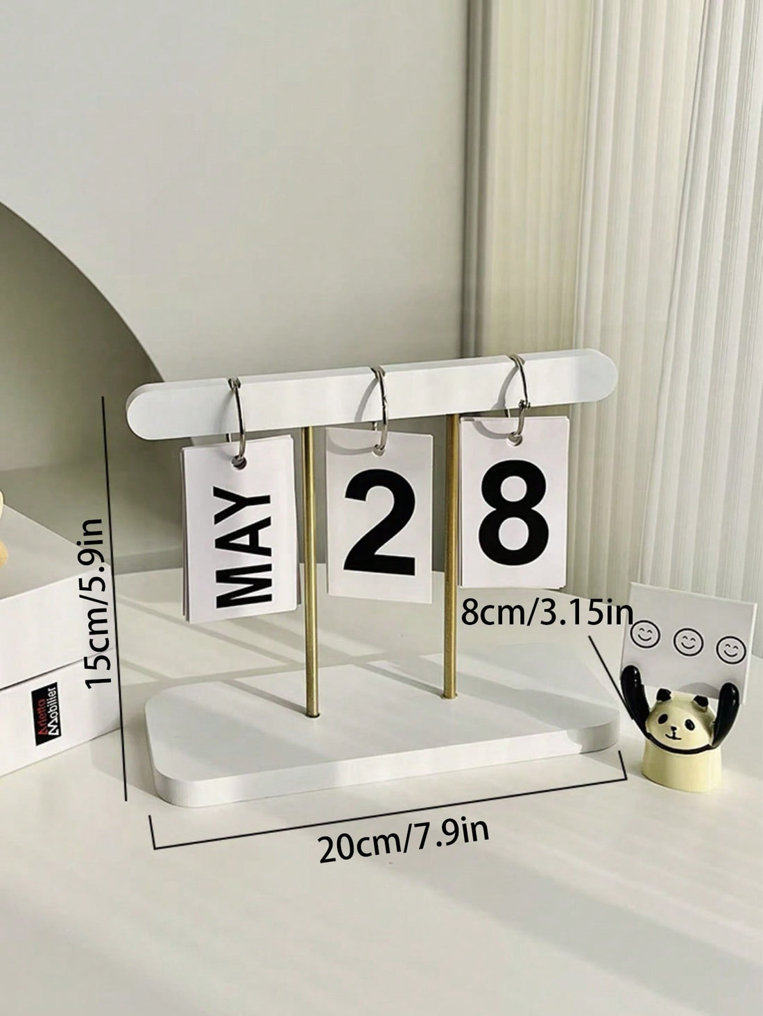 This Wooden Perpetual Calendar serves as a stylish and practical addition to your desk. With its modern minimalist design, it adds a touch of elegance to any workspace. Use it as a decorative piece or as a handy reminder of important dates. Made from high-quality wood, it's a durable and sustainable choice.