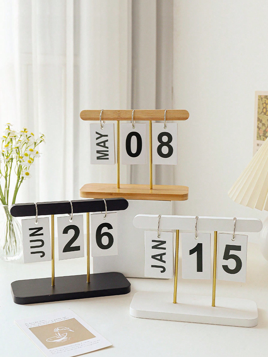 This Wooden Perpetual Calendar serves as a stylish and practical addition to your desk. With its modern minimalist design, it adds a touch of elegance to any workspace. Use it as a decorative piece or as a handy reminder of important dates. Made from high-quality wood, it's a durable and sustainable choice.