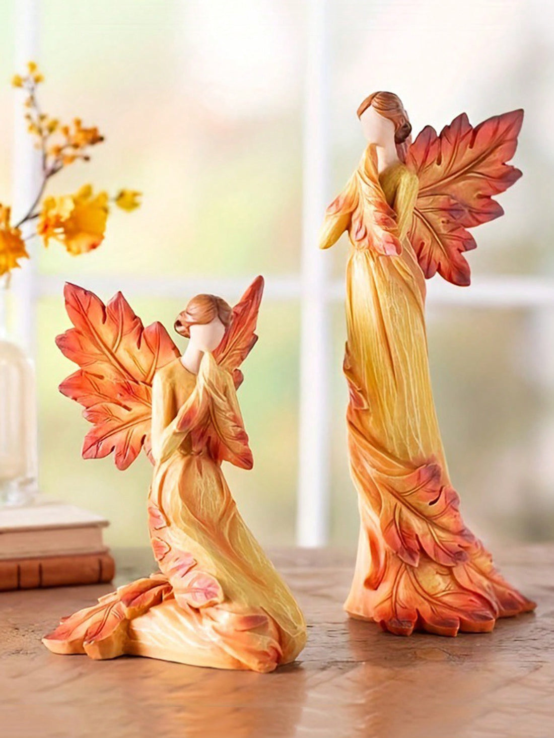 Embrace the beauty of autumn with our Fall Maple Leaf Angel Craft Decoration. Made from high-quality resin, this stunning piece adds a touch of charm to any space. The intricate design of the angel holding a maple leaf symbolizes the changing of seasons, making it the perfect addition to your fall decor.