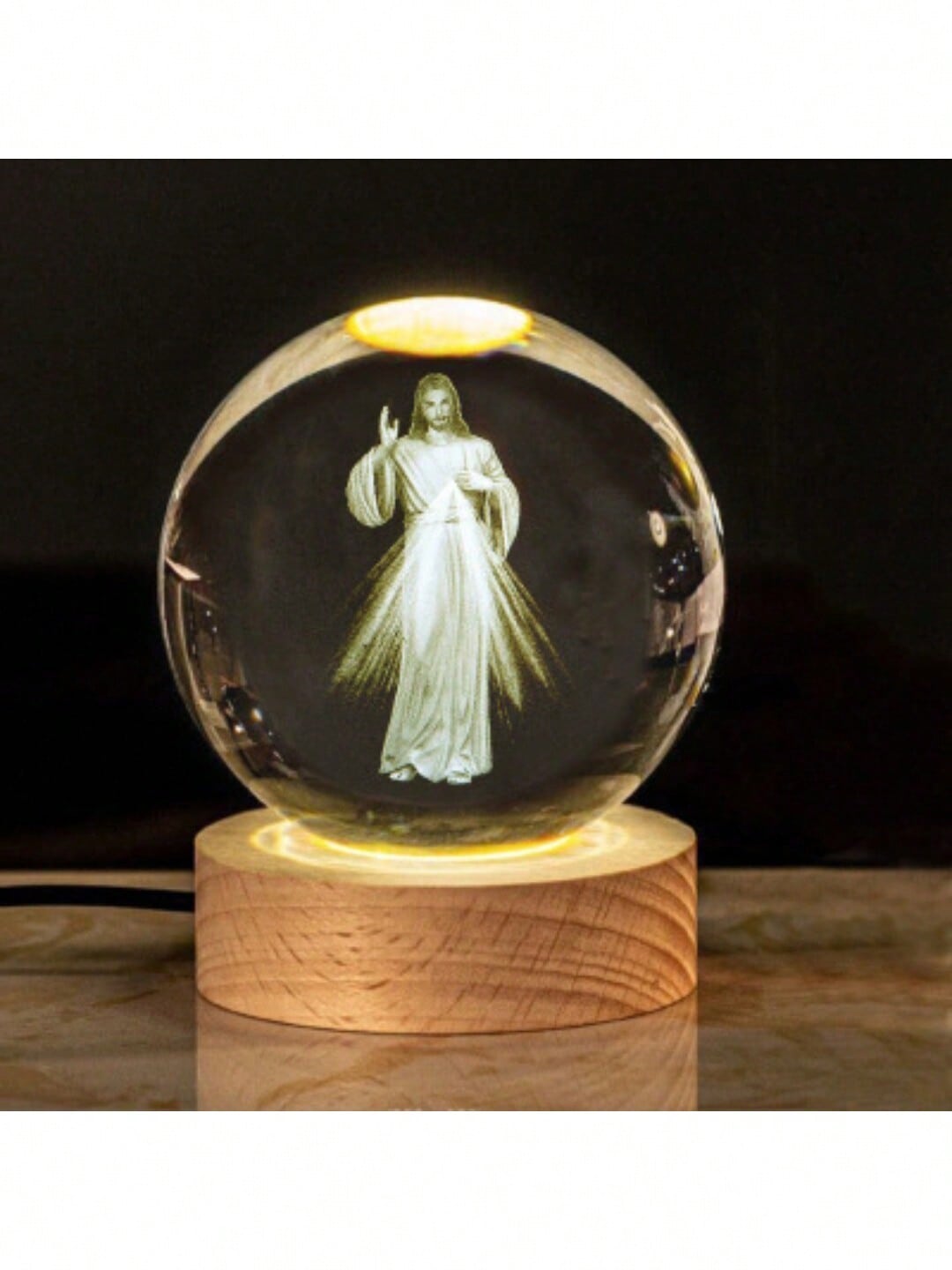 Add a touch of elegance to your loved one's holiday with our luxurious Crystal Ball Jesus Ornament. This stunning ornament features a beautifully crafted crystal ball with a depiction of Jesus, making it the perfect addition to any festive decor. Gift them a symbol of faith and love this holiday season.