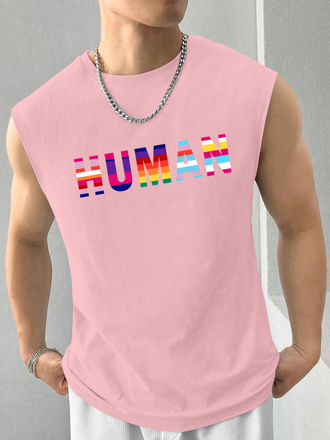 Enjoy the perfect combination of style and comfort with our Men's Pink Knitted Tank Top. Embrace the Letter Print design, boasting a regular fit that flatters all body types. Made with quality materials, this tank top will keep you cool and stylish all day long. Upgrade your wardrobe today!