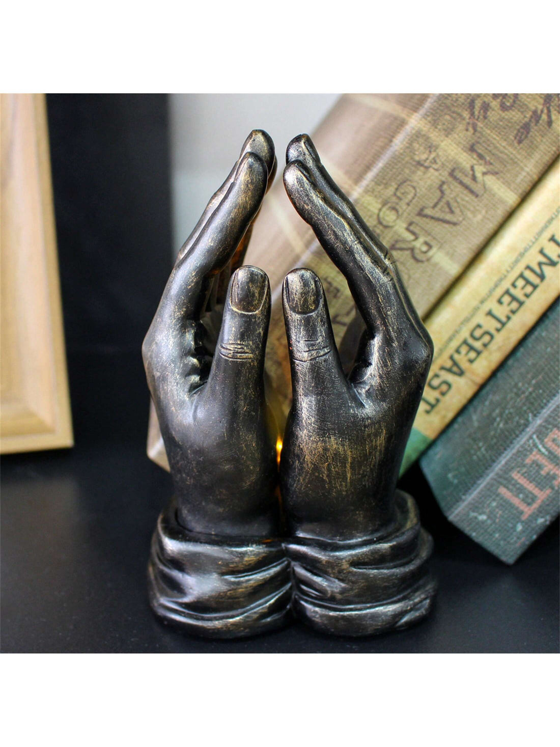 This Divine Reflection Resin Hand Figurine is the perfect addition to your living room decor. Handcrafted with intricate details, it exudes a serene and elegant presence. Made with high-quality resin, it is durable and long-lasting. Enhance your space with this unique and beautiful piece of art.