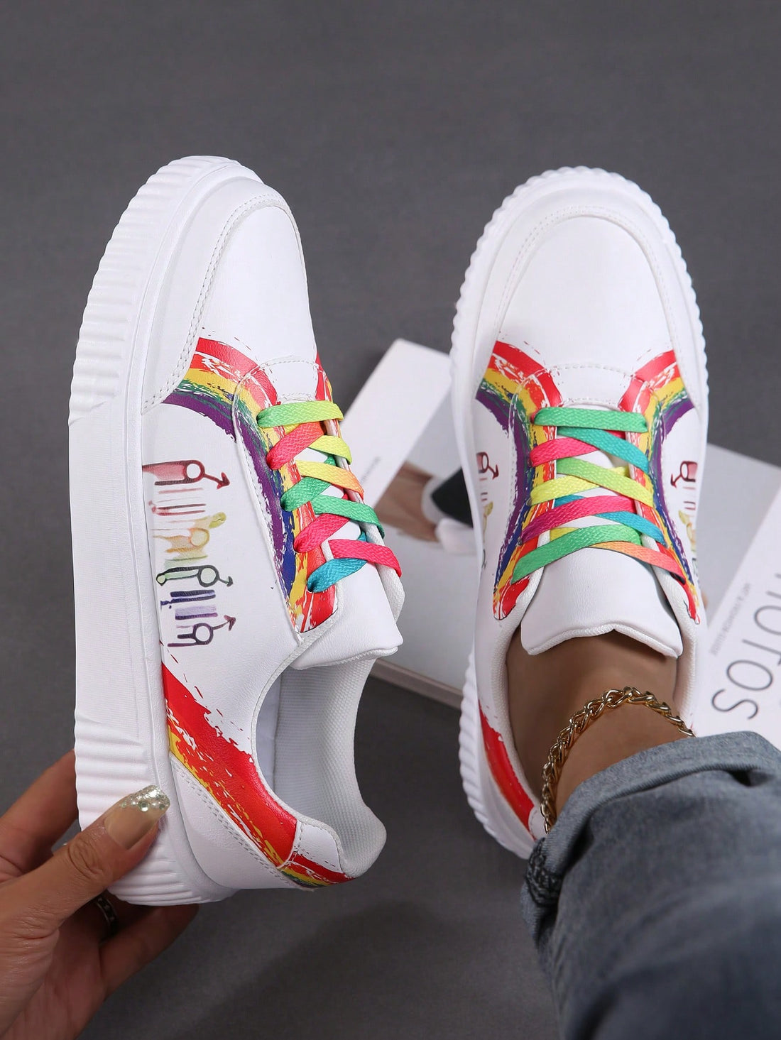 Introducing Rainbow Vibes, the perfect sneaker for couples. These lightweight and comfortable sneakers are designed to keep you and your significant other on your feet all day long. With a fun and vibrant rainbow design, these sneakers will not only keep you stylish but also provide the support you need. Get ready to step into the rainbow wherever you go!