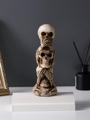 Add a spooky touch to your Halloween decor with our Triple Skulls, Lizard, and Snake Skeleton Resin Ornament. Crafted from durable resin, this table ornament features intricately detailed designs of three skulls, a lizard, and a snake. Perfect for adding a macabre touch to any room, this ornament will surely impress any Halloween enthusiast.