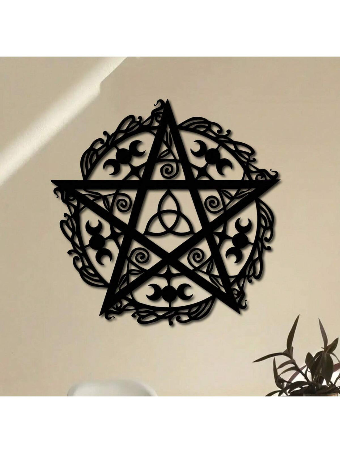 Enhance the look and feel of your home or office with our Mystical Pentagram Triple Moon Metal Wall Art. This modern piece adds a touch of mysticism and elegance to any space. Crafted with precision from high-quality metal, it's durable and long-lasting. Elevate your decor with this statement piece.