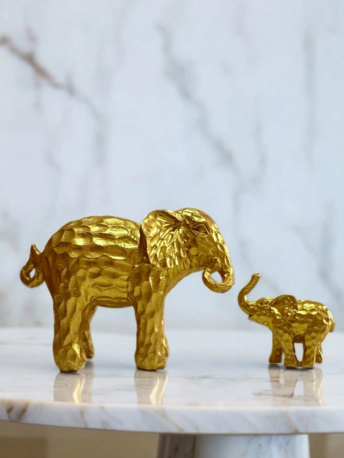 These Adorable Mother and Child Elephant Figurines will add a touch of charm and warmth to any home decor. Perfect for holidays like Thanksgiving and Christmas, they also make for thoughtful small gifts. Whether displayed on a shelf or used as table ornaments, they are a delightful addition to any room.