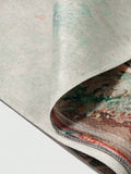 Close-up of beige linen-like weave and printed tapestry edge fold