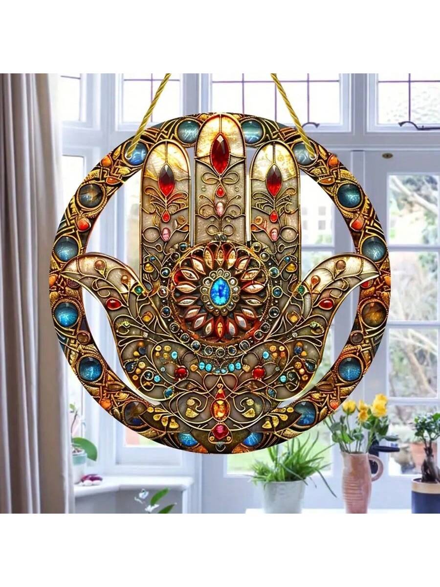 Enhance the ambiance of your home and garden with our versatile Hamsa Hand Suncatcher. Crafted from durable acrylic, this boho-inspired wall decor brings a touch of style and protection to any space. Perfect for indoor or outdoor use, it adds a unique flair while inviting positive energy into your surroundings.