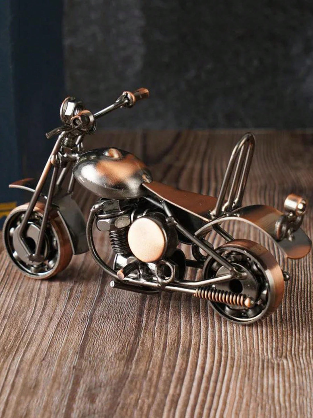 Introducing the Timeless Classic Motorcycle Statue, a perfect addition to any room. With its retro fashion and nostalgic design, it brings a touch of vintage charm to your space. Made with attention to detail, it's a must-have for any motorcycle enthusiast.